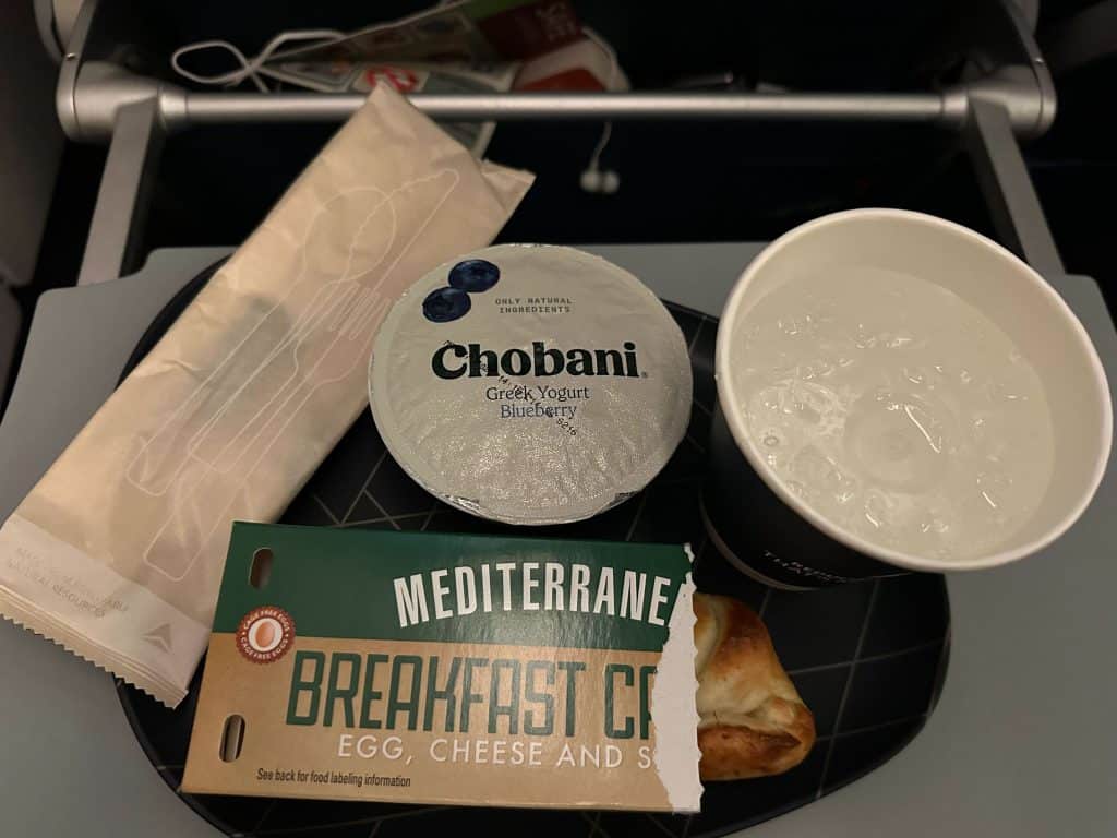 Delta SEA→ICN international inflight Mediterranean breakfast calzone, blueberry Chobani Greek yogurt & water