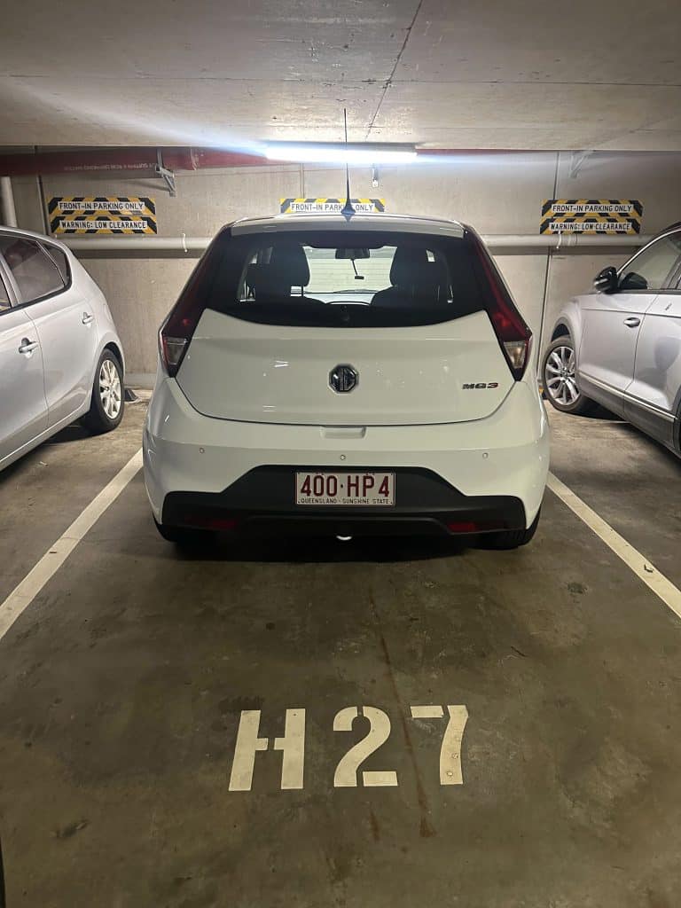 Hotel X Brisbane underground parking garage with front-in signage