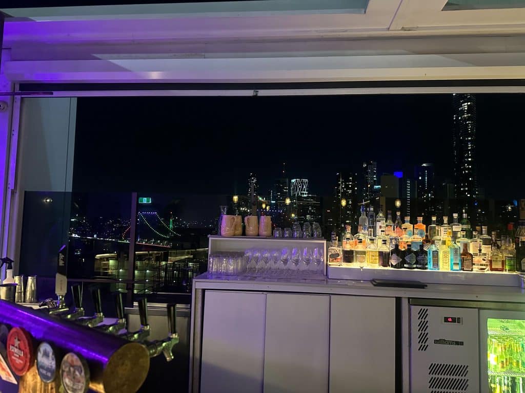 Brisbane skyline at night from Iris Rooftop Bar at Hotel X Brisbane