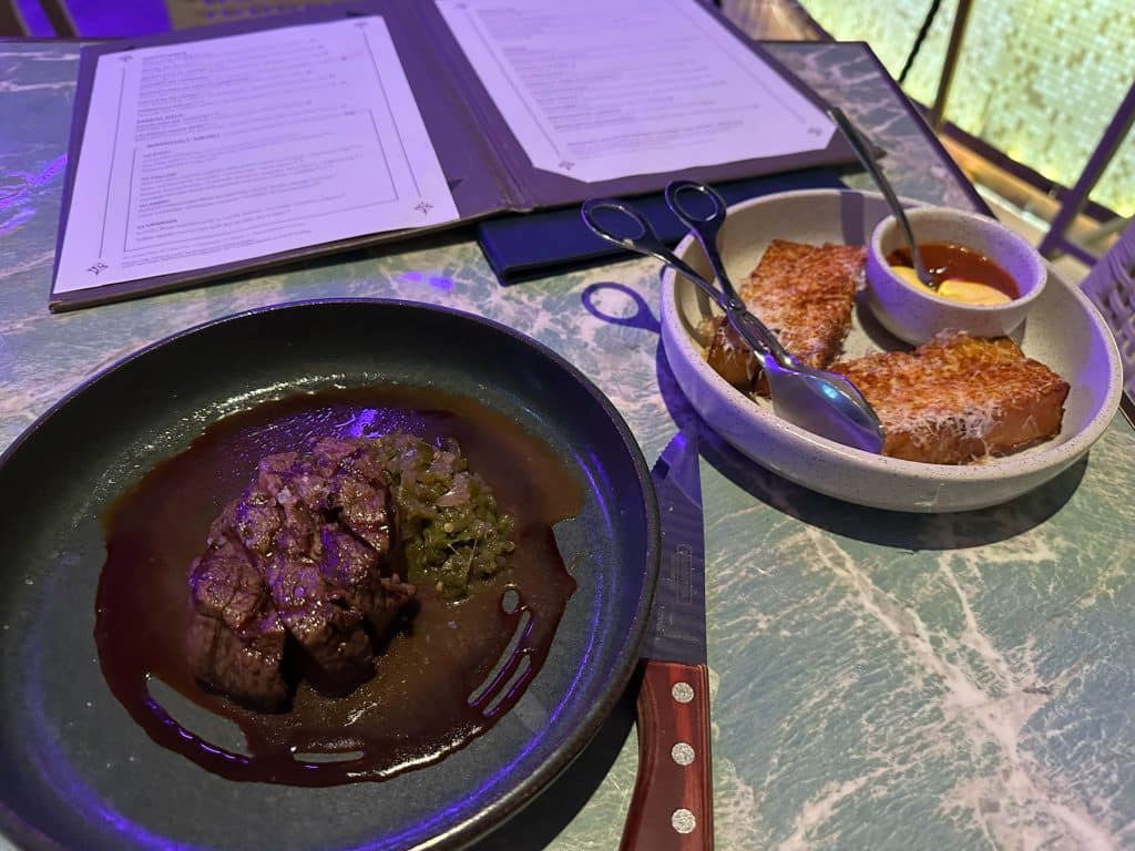 Bistec en salsa and Patatas Bravas dinner at Iris Rooftop, Hotel X Brisbane